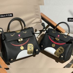Hermes Kelly Bag with Lucky Cat Print Togo Leather Gold Hardware In Black